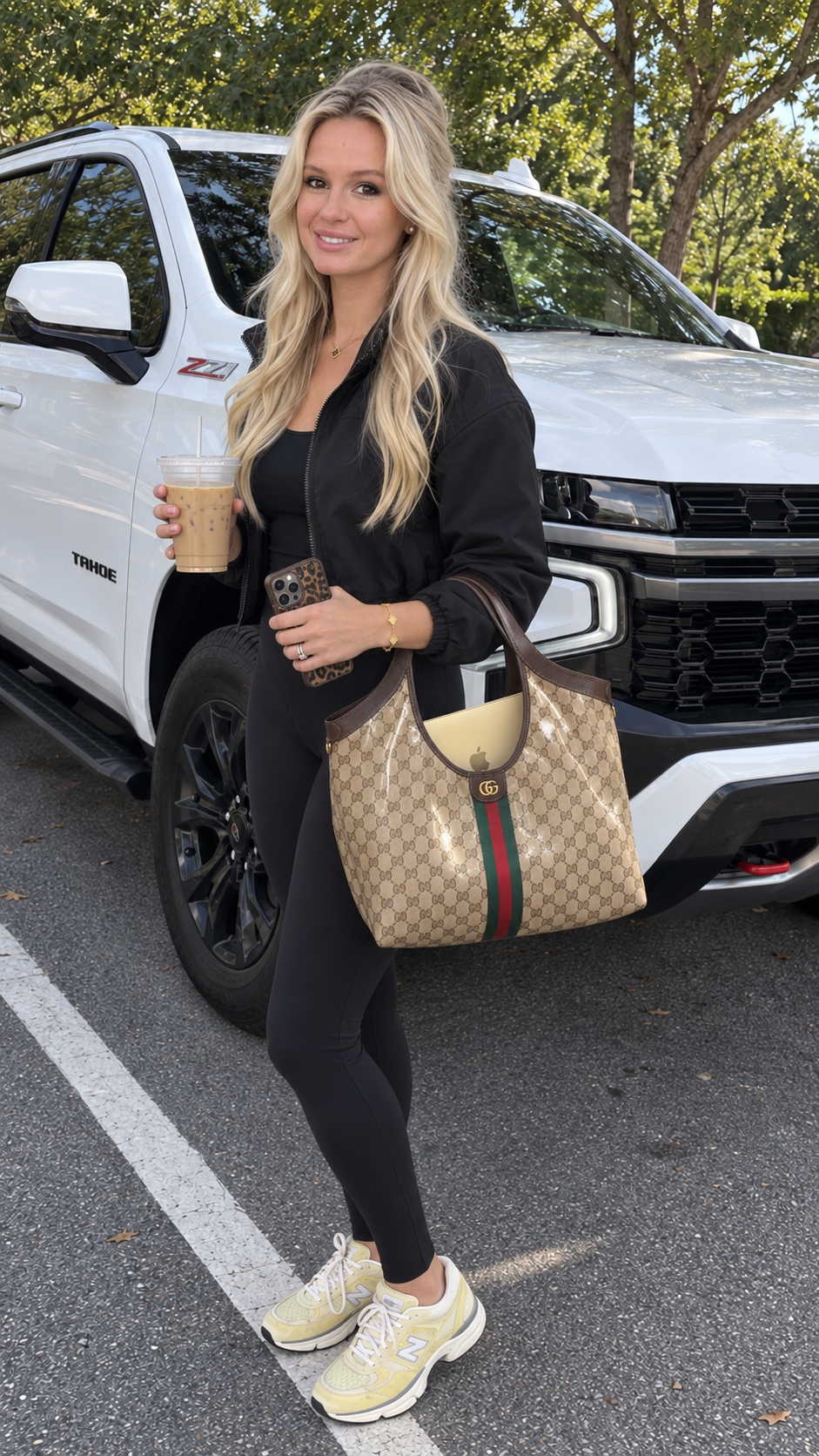 Katie's AI-created AI content engine version: black activewear, iced coffee, leopard phone case, tote and laptop beside her white Tahoe